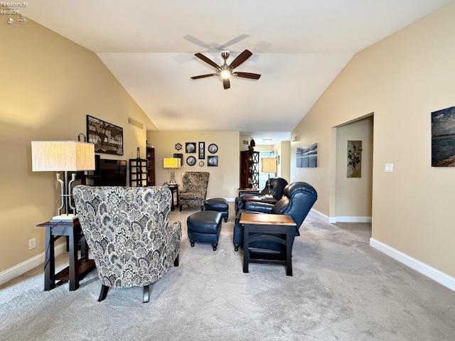 carpeted living room with lofted ceiling and ceiling fan