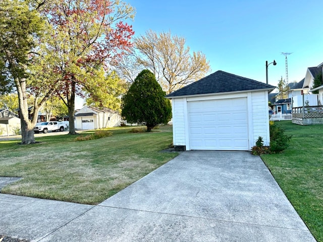 garage with a yard