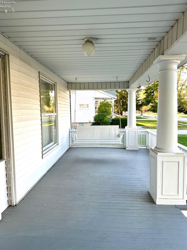 view of patio featuring a porch