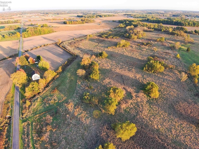 birds eye view of property featuring a rural view