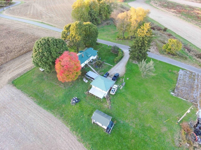 birds eye view of property featuring a rural view