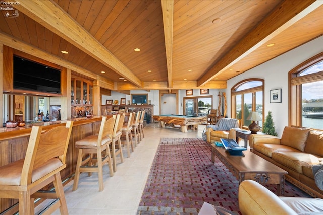 living room featuring pool table, wood ceiling, beam ceiling, indoor bar, and light tile patterned flooring