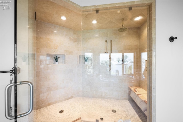 bathroom featuring an enclosed shower