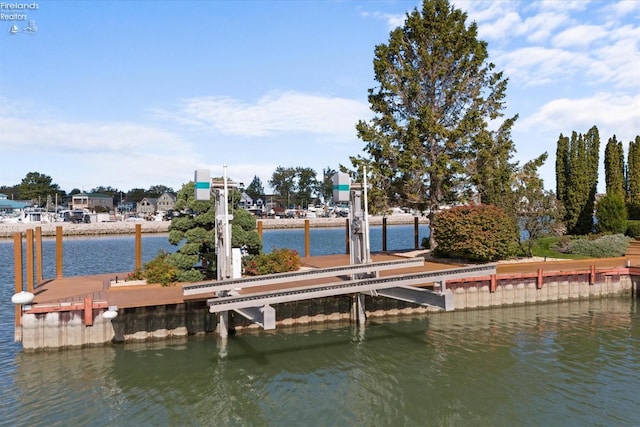 dock area featuring a water view