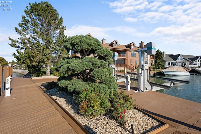 dock area with a water view