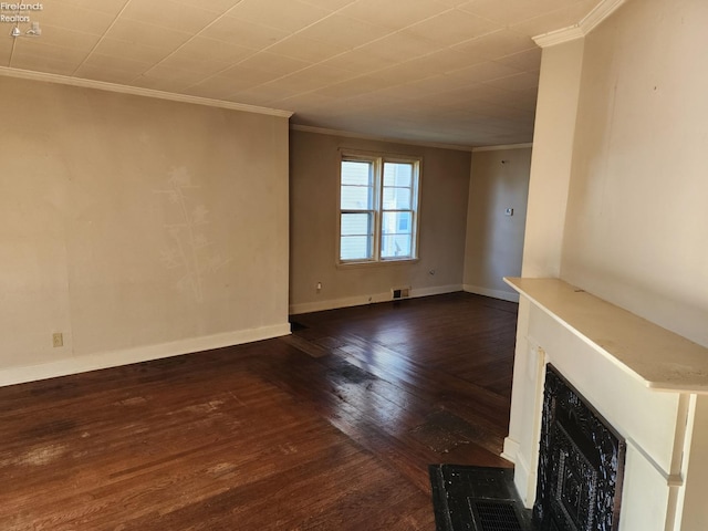 unfurnished living room featuring dark wood-type flooring and crown molding