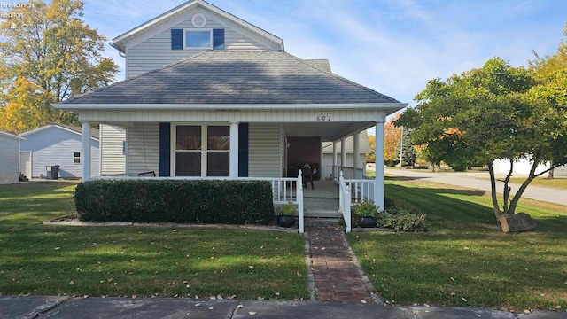 view of front of house featuring a porch and a front yard