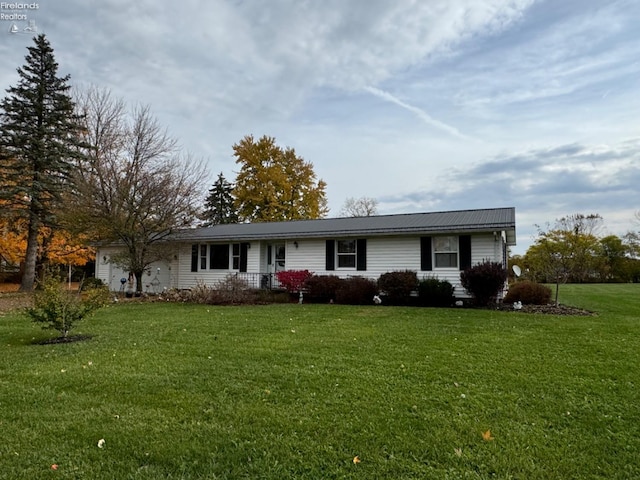 ranch-style house with a front lawn