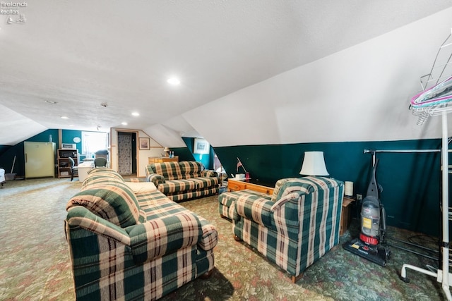 living room featuring carpet, a textured ceiling, and vaulted ceiling