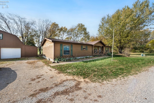 log home with a front lawn