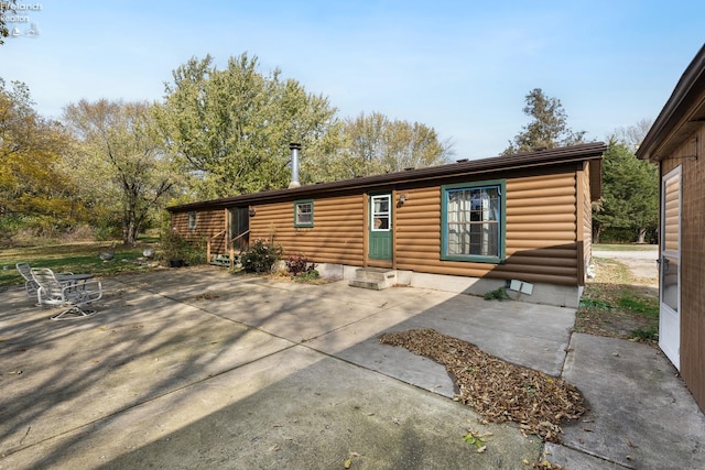 rear view of house featuring a patio area