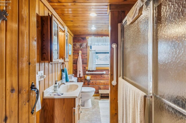 14136 Township Rd Unit 108, Findlay, OH 45840 - full bathroom with wooden walls, vanity, a stall shower, and toilet
