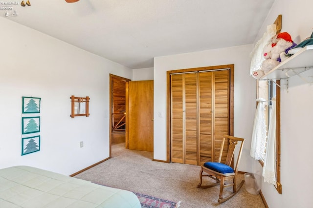 bedroom featuring a closet and carpet flooring