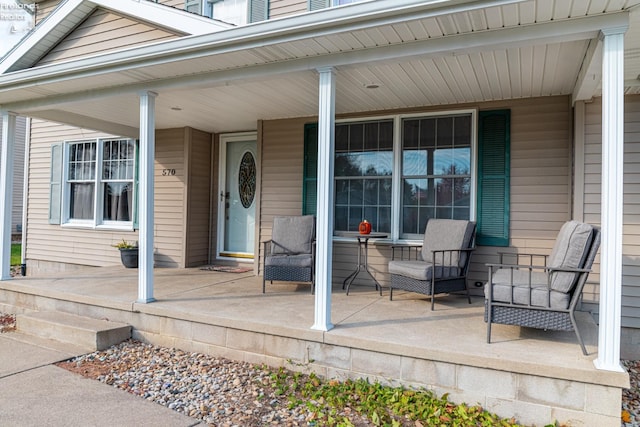 doorway to property with a porch