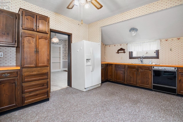 kitchen with light carpet, black dishwasher, dark brown cabinetry, sink, and white refrigerator with ice dispenser