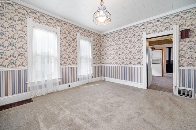 empty room with carpet and ornamental molding