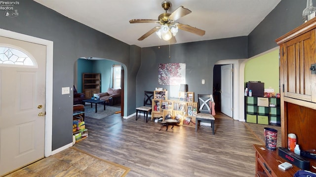 foyer with hardwood / wood-style flooring and ceiling fan