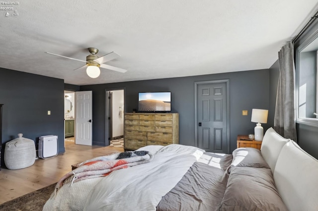 25 Edison, Milan, OH 44846 - bedroom with wood finished floors, ceiling fan, and baseboards
