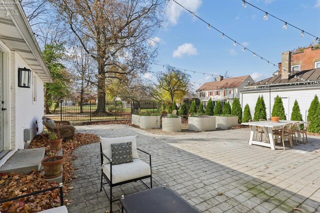 25 Edison, Milan, OH 44846 - view of patio / terrace with outdoor dining area and a residential view