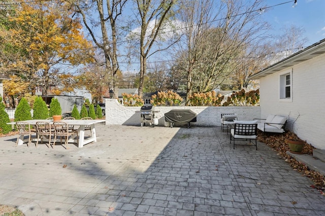 25 Edison, Milan, OH 44846 - view of patio / terrace with outdoor dining space and area for grilling