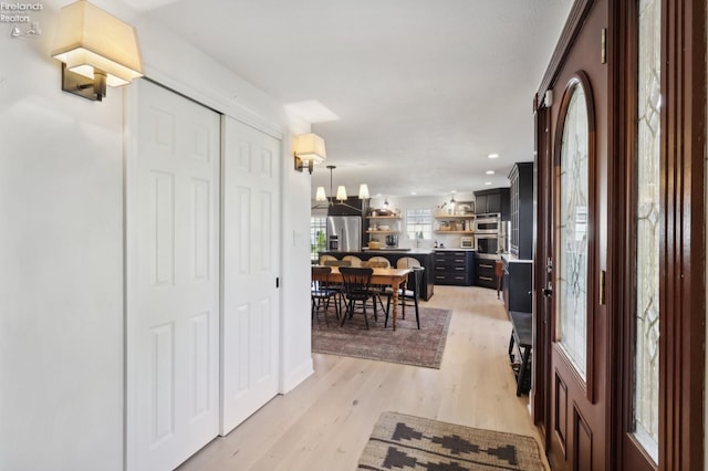 25 Edison, Milan, OH 44846 - foyer with light wood-style flooring and recessed lighting