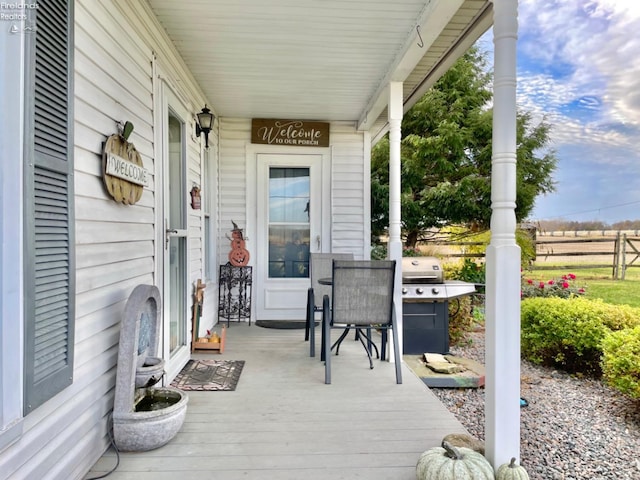 view of patio / terrace with a porch and area for grilling