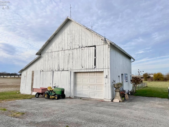 garage with a yard