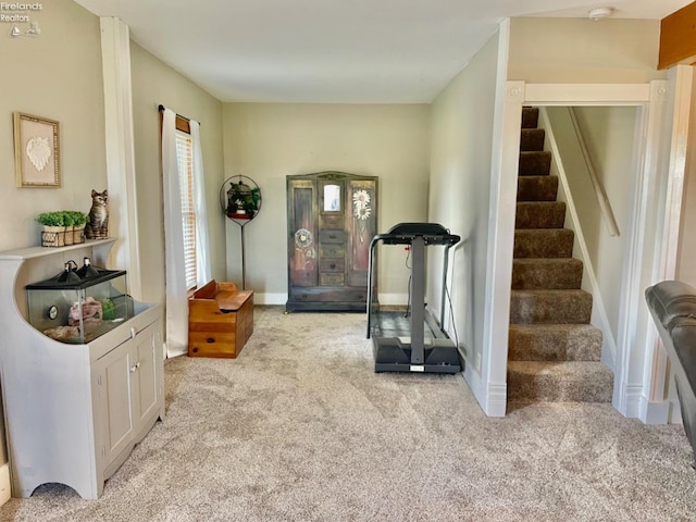 workout room with light carpet