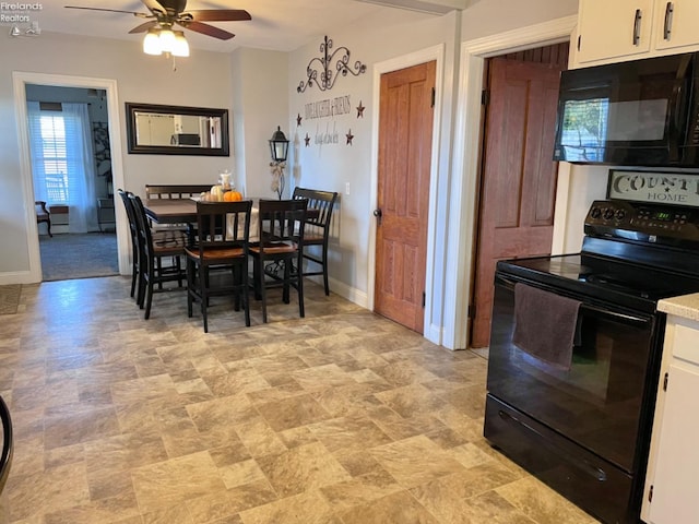 dining space featuring ceiling fan