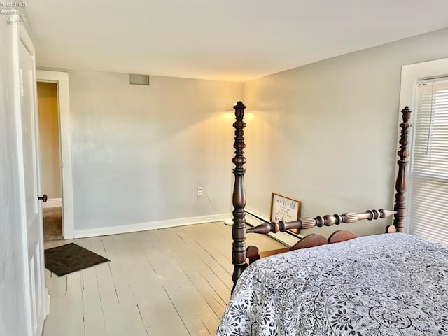 bedroom with light wood-type flooring