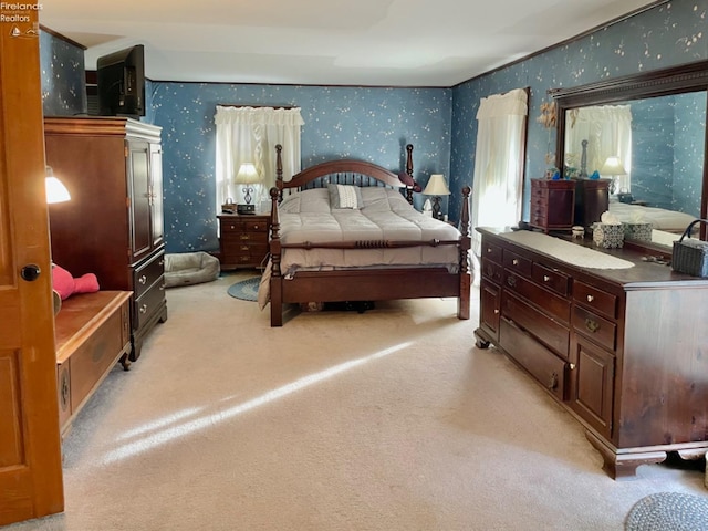 bedroom with light colored carpet