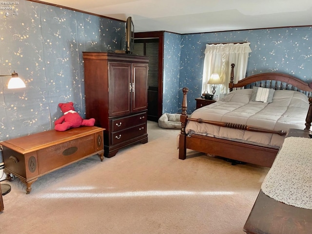 bedroom with light colored carpet