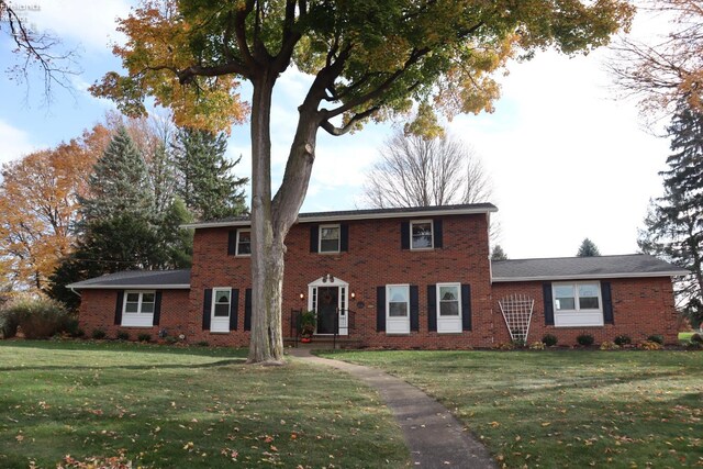 colonial house with a front yard