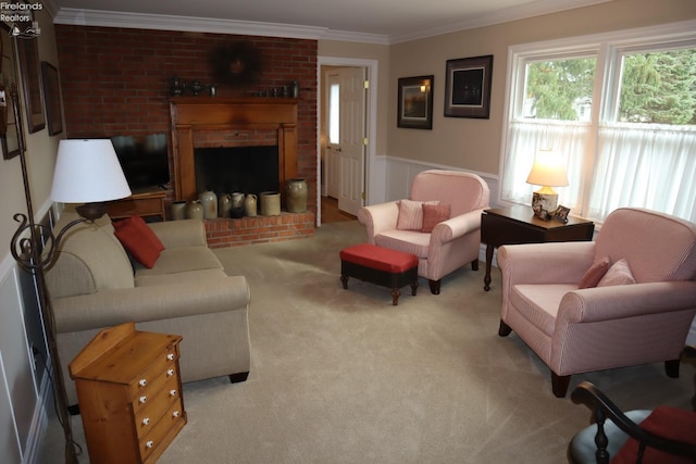 carpeted living room with a fireplace and ornamental molding