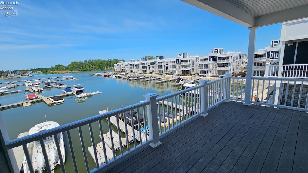 wooden terrace with a water view