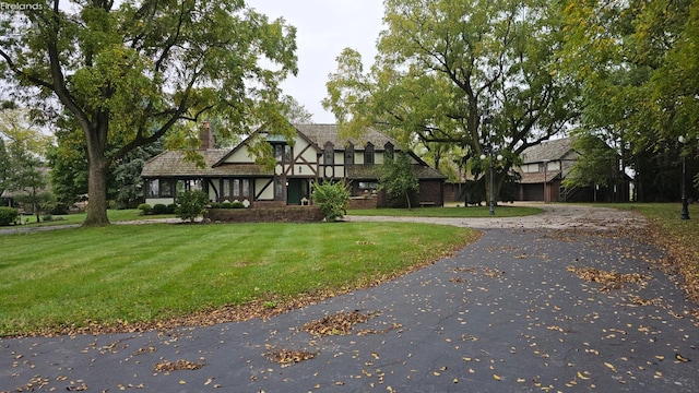 view of front of home with a front yard