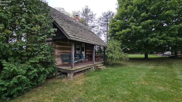 view of yard featuring a wooden deck