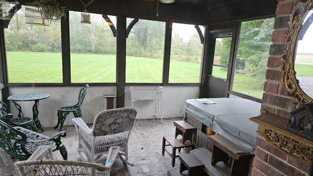 sunroom featuring plenty of natural light