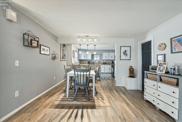 dining room featuring hardwood / wood-style floors