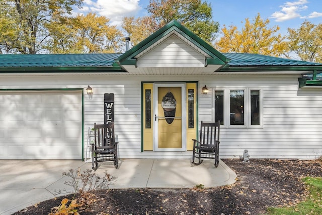 property entrance with a garage