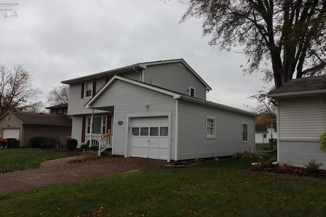 front of property with a garage and a front yard