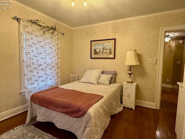 bedroom with a textured ceiling, ornamental molding, and dark wood-type flooring