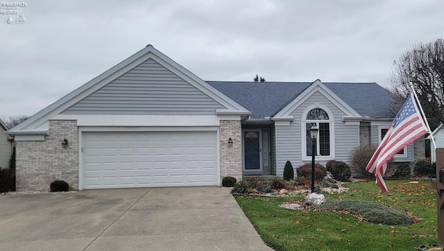 single story home with a garage