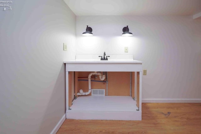 bathroom featuring hardwood / wood-style floors