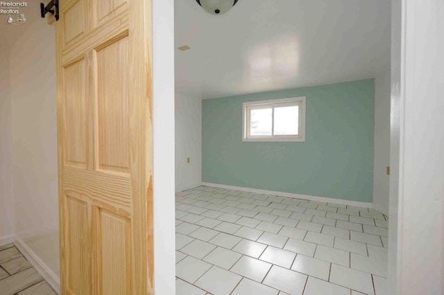 empty room featuring light tile patterned flooring