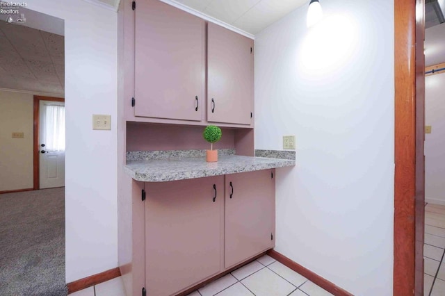 kitchen featuring light tile patterned floors