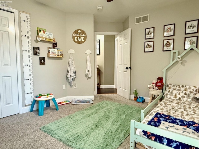 bedroom featuring carpet