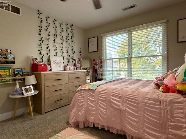 carpeted bedroom with ceiling fan