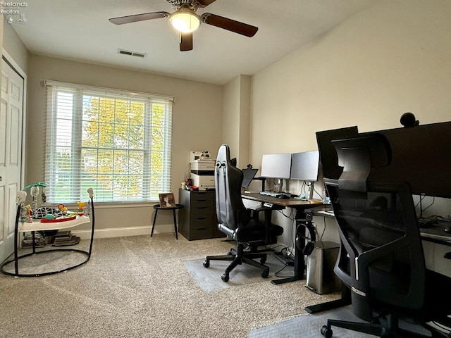 office with ceiling fan and carpet flooring