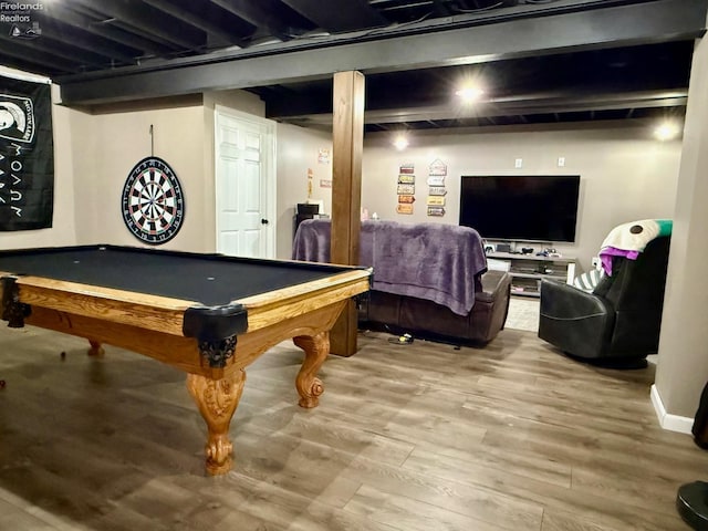 rec room with beamed ceiling, hardwood / wood-style flooring, and billiards